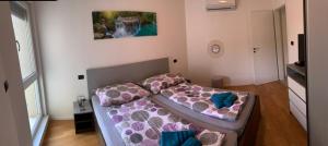 Postel nebo postele na pokoji v ubytování Meli Maisonette Apartments