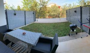Zahrada ubytování Meli Maisonette Apartments