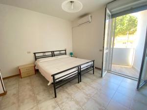 Postel nebo postele na pokoji v ubytování Venere Apartament