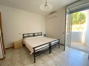 Postel nebo postele na pokoji v ubytování Venere Apartament