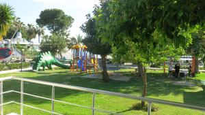 a playground with a slide in a park at Summer House by the Sea - 40 m to the beach in Side