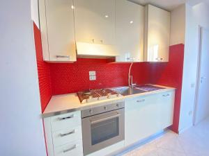 Kuchyň nebo kuchyňský kout v ubytování Venere Apartament