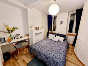 Posteľ alebo postele v izbe v ubytovaní Apartement Lille
