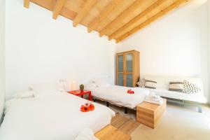 Postel nebo postele na pokoji v ubytování Finca Boutique Can Regalat + 28 fotografií