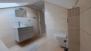 Koupelna v ubytování Apartman FARMA HRADEC