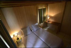 Llit o llits en una habitació de Gîte le Fouquet