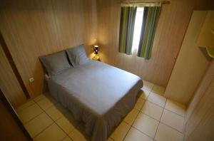 Llit o llits en una habitació de Gîte le Fouquet