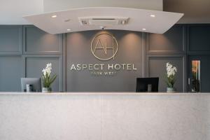 a reception desk in a park west hotel lobby at Aspect Hotel Park West in Clondalkin 