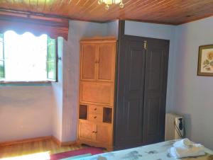 Łóżko lub łóżka w pokoju w obiekcie La Maison du Carlit