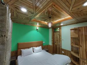 Giường trong phòng chung tại Alpine Valley Homestay