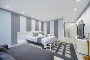 Postel nebo postele na pokoji v ubytování Villa Uno