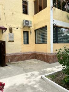 a building with a speaker on the side of it at Апартамент in Samarkand +4 photos