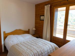 Łóżko lub łóżka w pokoju w obiekcie Appartement Briançon, 4 pièces, 8 personnes - FR-1-330C-12