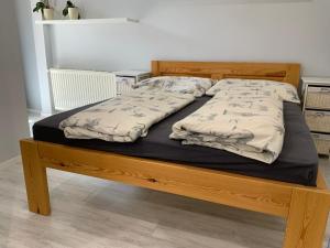 Posteľ alebo postele v izbe v ubytovaní Jerry Apartman