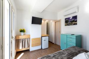 Et tv og/eller underholdning på Center house rooms