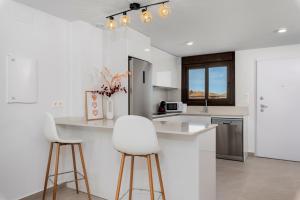 Kuchyň nebo kuchyňský kout v ubytování Luxury apartment Salinas