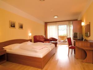 Postel nebo postele na pokoji v ubytování Hotel Angerer-Hof