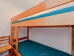 Palanda nebo palandy na pokoji v ubytování Apartment Front de Mer-8 by Interhome