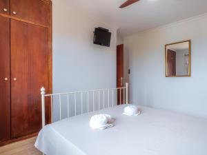 Łóżko lub łóżka w pokoju w obiekcie Villa Cala Torta Na Moli by Interhome