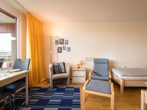 Et opholdsområde på Apartment B609 by Interhome + 25 billeder