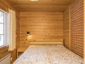 Giường trong phòng chung tại Holiday Home Suopursu by Interhome +10 ảnh