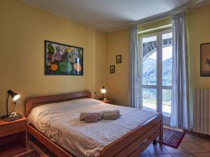 A bed or beds in a room at Apartment Poggio degli Ulivi by Interhome