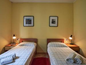 A bed or beds in a room at Apartment Poggio degli Ulivi by Interhome