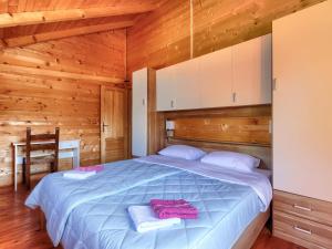 Postel nebo postele na pokoji v ubytování Holiday Home Minja by Interhome
