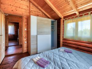 Postel nebo postele na pokoji v ubytování Holiday Home Minja by Interhome