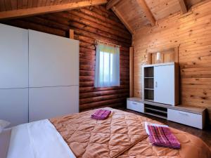 Postel nebo postele na pokoji v ubytování Holiday Home Minja by Interhome
