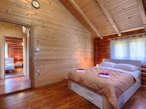 Postel nebo postele na pokoji v ubytování Holiday Home Minja by Interhome