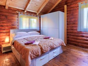 Postel nebo postele na pokoji v ubytování Holiday Home Minja by Interhome