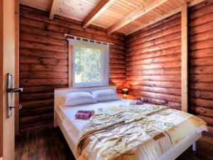 Postel nebo postele na pokoji v ubytování Holiday Home Minja by Interhome