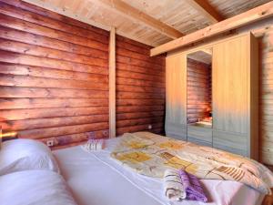 Postel nebo postele na pokoji v ubytování Holiday Home Minja by Interhome