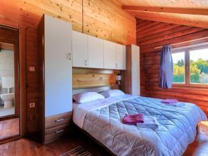 Postel nebo postele na pokoji v ubytování Holiday Home Minja by Interhome