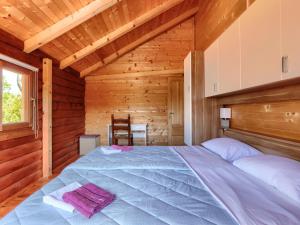 Postel nebo postele na pokoji v ubytování Holiday Home Minja by Interhome