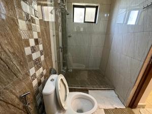 Phòng tắm tại Nyachaba Apartment +7 ảnh