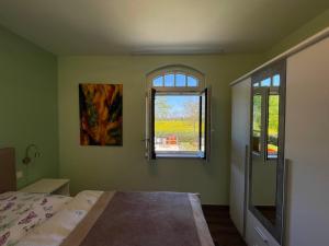 Postel nebo postele na pokoji v ubytování Apartment Tulpe by Interhome