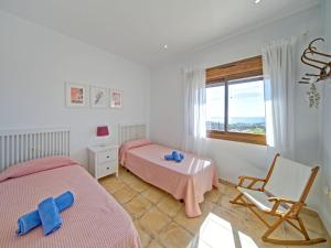 Posteľ alebo postele v izbe v ubytovaní Villa Anna by Interhome