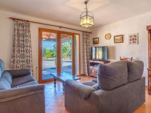 Posezení v ubytování Villa Hort des Xilindro by Interhome