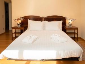 Postel nebo postele na pokoji v ubytování Apartment L'Esplanade A1-4 by Interhome