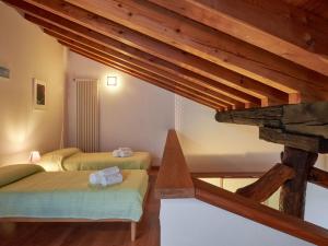 Кровать или кровати в номере Holiday Home La Cascina by Interhome