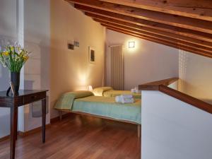 Кровать или кровати в номере Holiday Home La Cascina by Interhome
