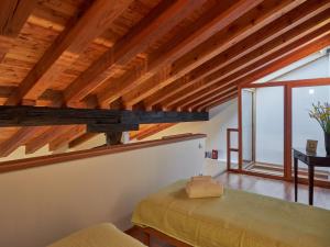 Кровать или кровати в номере Holiday Home La Cascina by Interhome