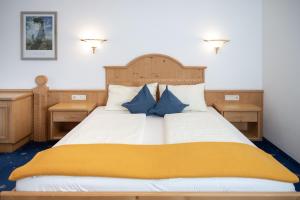 Ένα ή περισσότερα κρεβάτια σε δωμάτιο στο Hotel Waidachhof