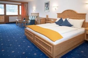 Ένα ή περισσότερα κρεβάτια σε δωμάτιο στο Hotel Waidachhof