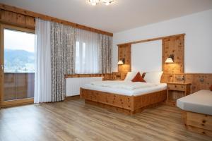 Ένα ή περισσότερα κρεβάτια σε δωμάτιο στο Hotel Waidachhof