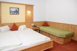 Ένα ή περισσότερα κρεβάτια σε δωμάτιο στο Hotel Waidachhof
