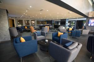 Khu vực ghế ngồi tại HOTEL BELLE VUE MEKNES