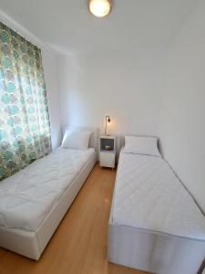 Posteľ alebo postele v izbe v ubytovaní Villa Porto